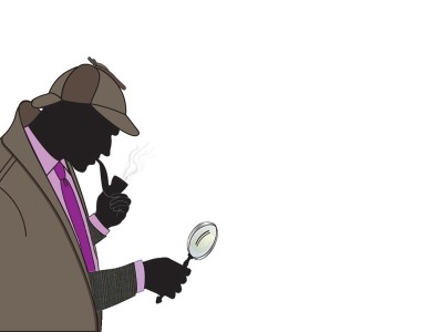 Detektiv i profil kigger gennem forstørrelsesglas. 